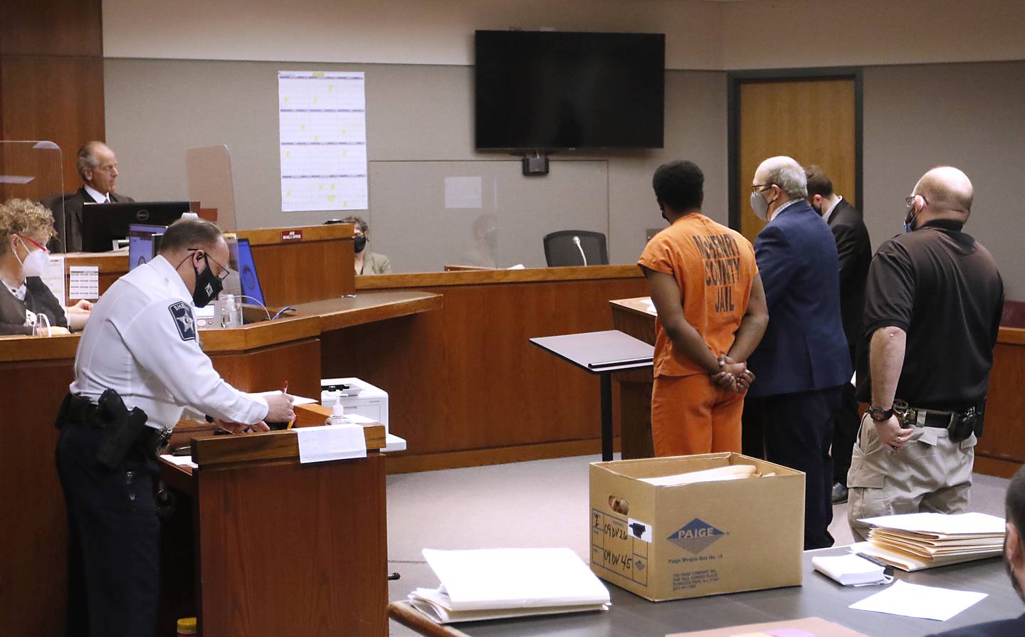 Dante L. Terrell appears with his attorney, Robert Ritacca, during a hearing Thursday, Feb. 24, 2022, before Judge Michael Coppedge at the McHenry County Michael J. Sullivan Judicial Center in Woodstock. Terrell faces multiple felonies, including attempted murder, in connection with an exchange of gunfire that happened in August at a McHenry intersection.