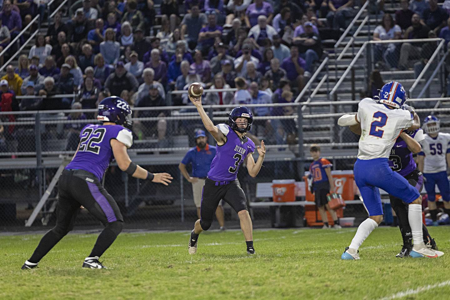 Dixon’s Tyler Shaner fires a pass Thursday, Sept. 14, 2023 against Genoa-Kingston in a game at Dixon High School.