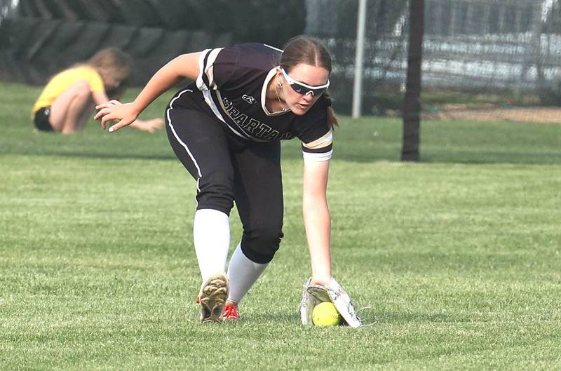 Sycamore's Brighton Snodgrass fields a ball in the outfield during their game against Dundee-Crown Thursday, May 18, 2023, at Sycamore High School.