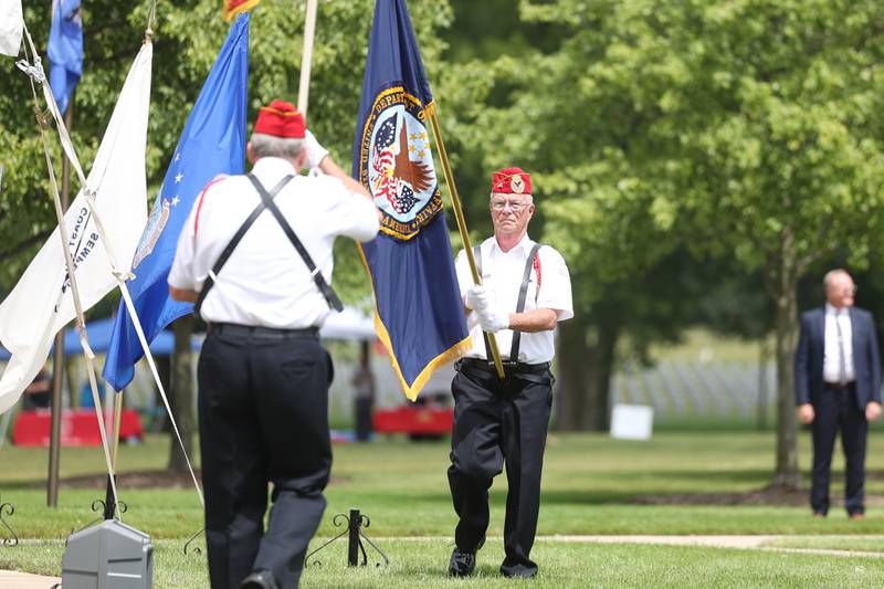 Members of the John Whiteside Ceremonial Color Guard retire the Colors at the National Cemetery Administration 50th Anniversary ceremony at the Abraham Lincoln National Cemetery in Elwood on Saturday, July 29.