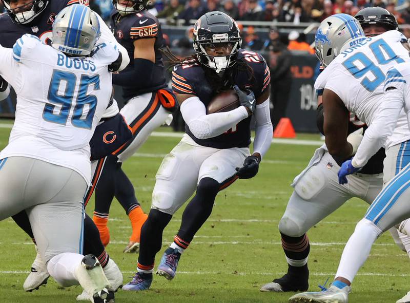 Chicago Bears running back D'Onta Foreman finds a hole in the Detroit Lions defensive line during their game Sunday, Dec. 10, 2023 at Soldier Field in Chicago.