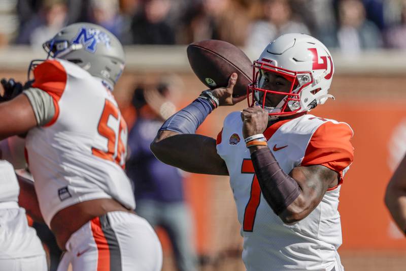 Liberty quarterback Malik Willis throws a pass during the Senior Bowl on Feb. 5, 2022, in Mobile, Ala.