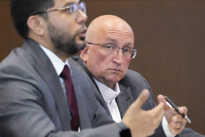 Attorney George Gomez, left, speaks to Judge George D. Strickland as Robert E. Crimo Jr., looks on during an appearance at the Lake County Courthouse, Monday, Aug. 7, 2023, in Waukegan.