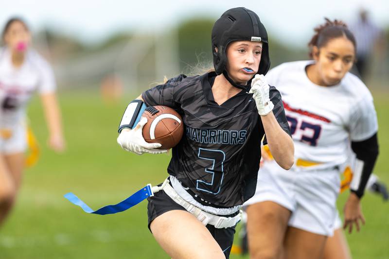 Willowbrooks McKenzie Edison runs the ball for a gain against West Aurora at the Sectional Final on Tuesday, Oct. 14,2025 in South Elgin.