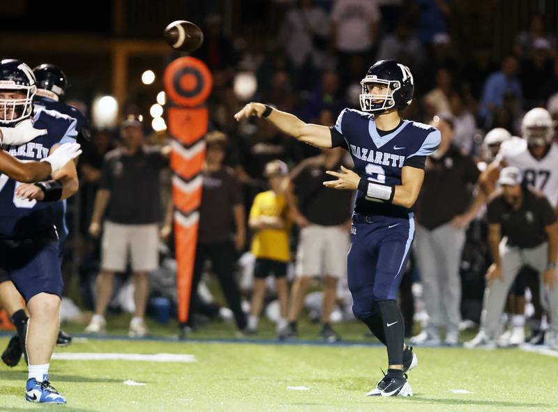 Nazareth's Jackson Failla (2) throws during the varsity football game between Mt. Carmel high school and Nazareth Academy on Friday, Sept. 12, 2025 in La Grange Park, IL.
