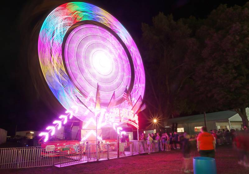 A fifteen-second exposure of the Zipper carnival ride during the 170th annual Bureau County Fair on Saturday, Aug. 23, 2025 in Princeton.