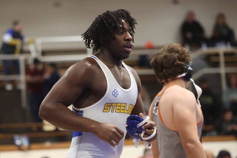 Joliet Central’s Charles Walker leaves the mat after his win over Romeoville’s Salemeen Algahami in the Joliet Central McLaughlin Classic on Saturday, Dec. 2, 2023 in Joliet.