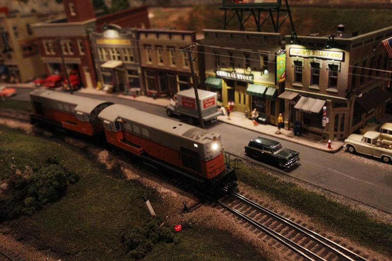 A Road Switcher comes through the Village of Deerfield at night at the Lake County Model Railroad Club in Wauconda. The club is celebrating their 50th anniversary.