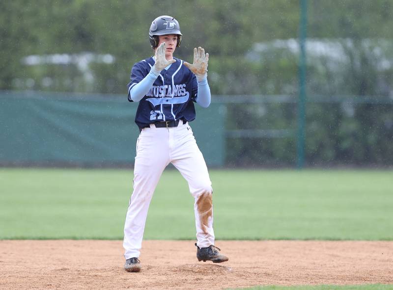 Downers Grove South's Wyatt Wawro (27) stands on second after a double during the varsity baseball game between Downers Grove South and Downers Grove North in Downers Grove on Saturday, April 29, 2023.