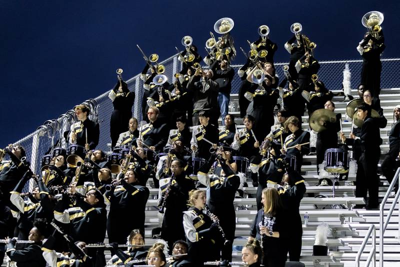 The Joliet West Marching Tigers perform during a varsity football game against Plainfield East at Joliet West on Oct. 10, 2025.