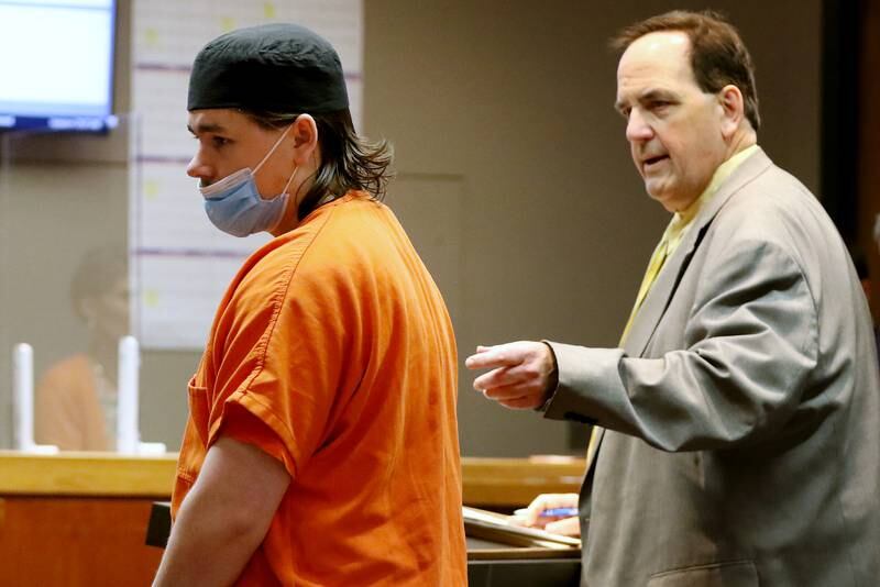Devin Petersen appears in court with attorney Thomas Carroll, right, inside Judge Robert Wilbrandt's courtroom at the Michael J. Sullivan Judicial Center on Friday, June 25, 2021 in Woodstock. Petersen, along with William Linke and Michael Miller, is being charged in the murder of Robert Krikie at Three Oaks Recreation area on March 17, 2020.