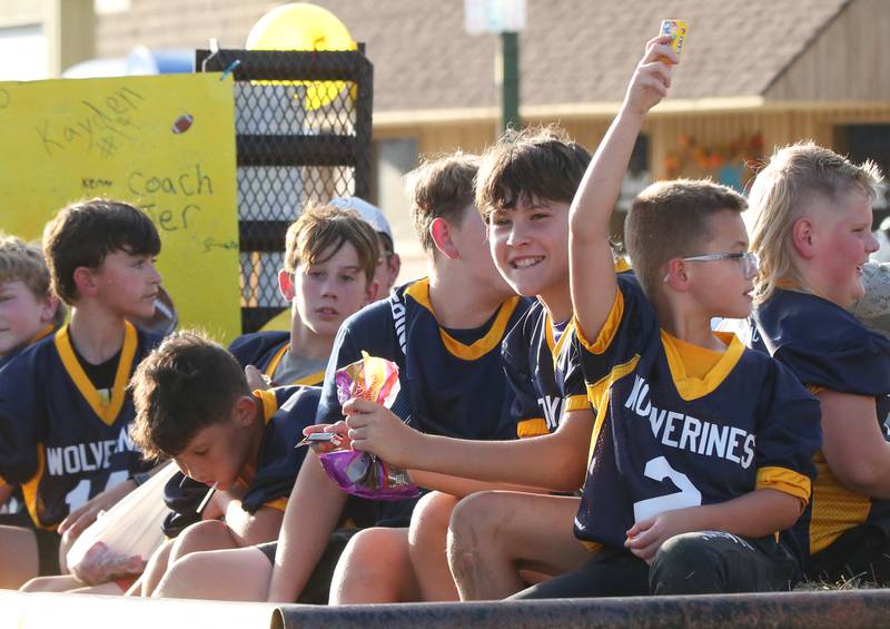 Spring Valley flag football players ride a float during the Hall High School Homecoming parade on Thursday, Sept. 28, 2023 in Spring Valley.