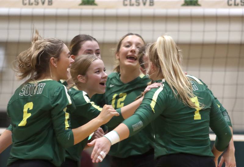 Crystal Lake South’s Gators celebrate a win over Lakes  in IHSA Class 3A Sectional semifinal volleyball action on Tuesday, Nov. 5, 2024, at  Crystal Lake South High School  in Crystal Lake.