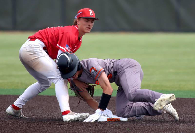 McHenry’s Landon Clements arrives safely at second base as Barrington’s Zack Ostergaard applies a tag  in IHSA Class 4A Sectional Title Game baseball action at McHenry High School in McHenry on Saturday, June 7, 2025.