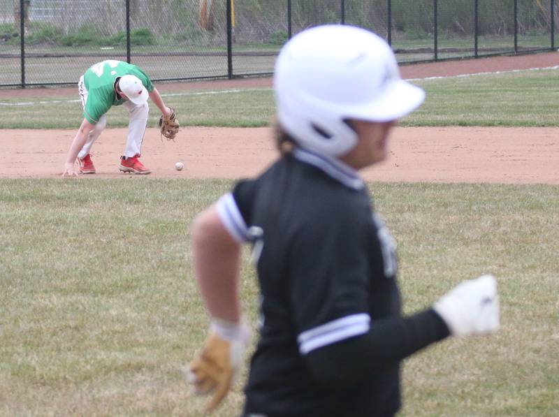 L-P's third baseman Jacob Gross draws an error as Kaneland's Jack Wituk reaches first on Thursday, April 11, 2024 at Huby Sarver Field in La Salle.