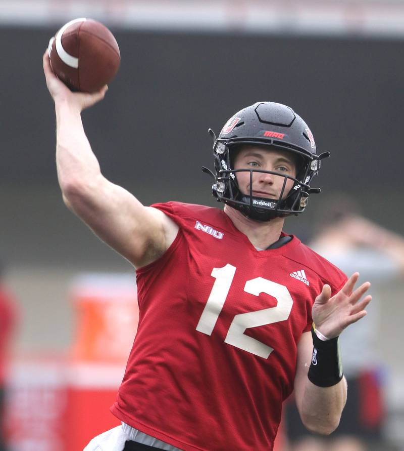 Northern Illinois University quarterback Rocky Lombardi throws a pass during spring practice Wednesday, March 23, 2022, in Huskie Stadium at NIU in DeKalb.