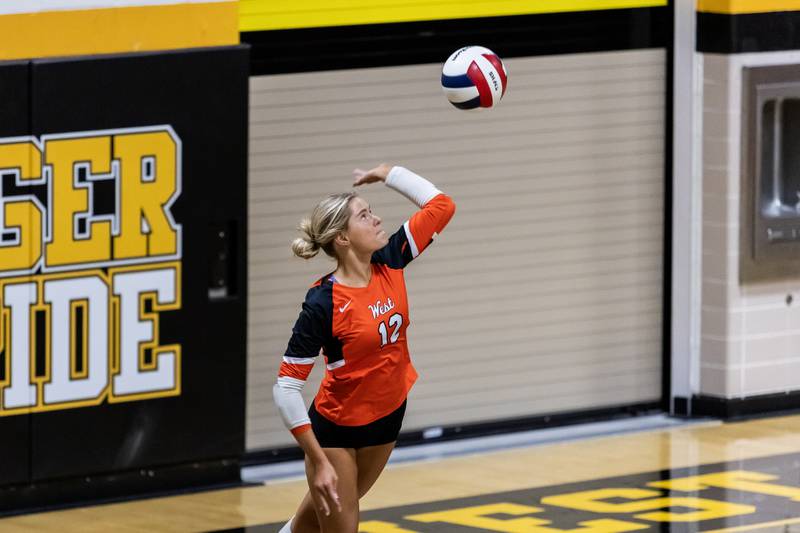 Lincoln-Way West's Kynzi Markowicz serves during a varsity volleyball away game against Joliet West on Sept. 15, 2025.