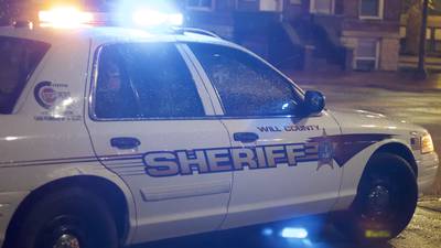 Lockport Township residence struck by gunfire with three people inside