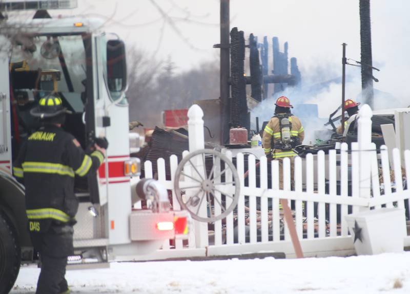 Firefighters work the scene of a structure fire in the 4000 block of East 16th Road on Thursday, Feb. 5, 2026 near Earlville. Fire departments from Serena, Mendota, Troy Grove and others were dispatched shortly after 12p.m. to the fire. The fire was upgraded to the second alarm through the Mutual Aid Box Alarm System (MABAS 25) shortly after.