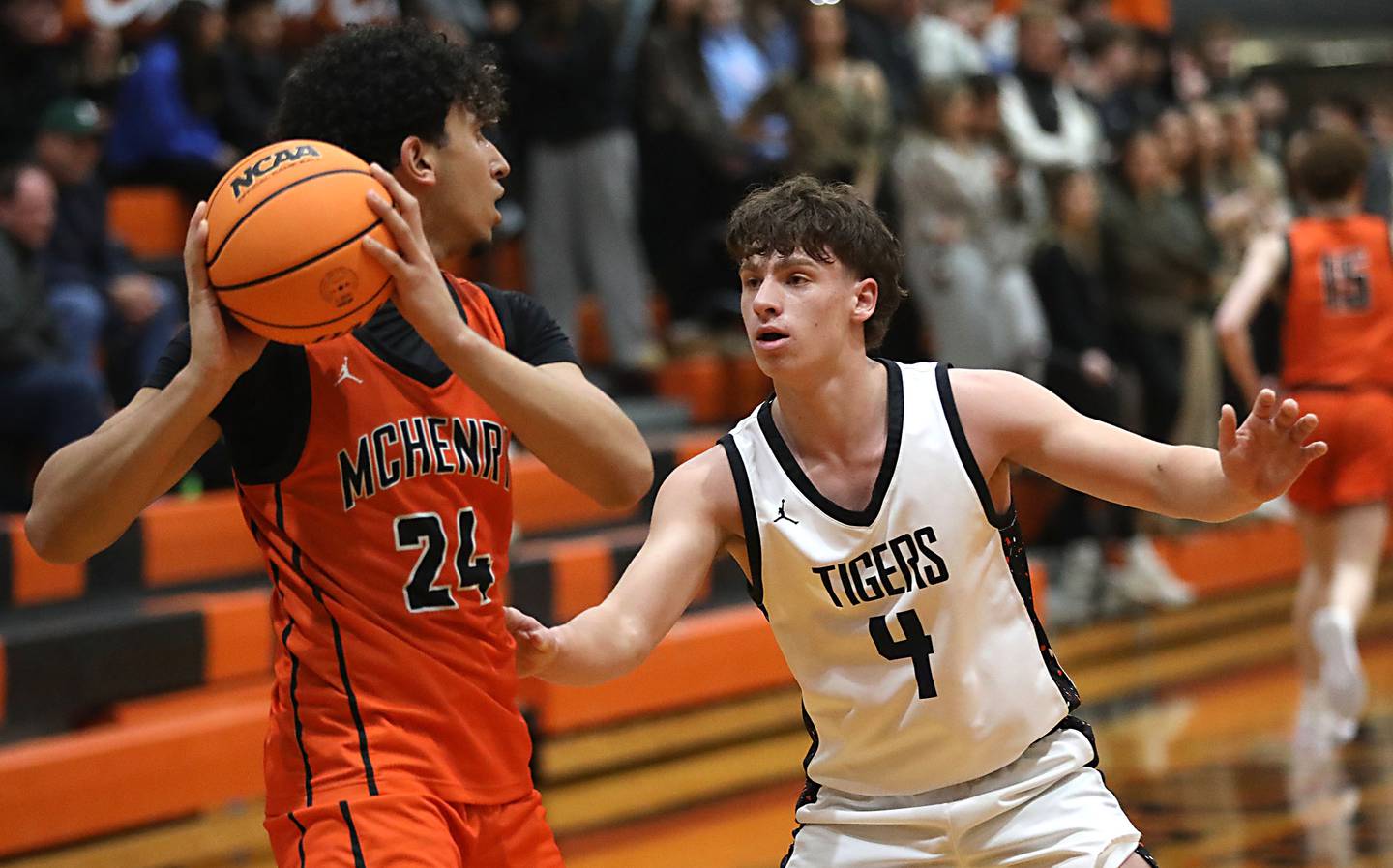 Crystal Lake Central's Bud Shanahan guards McHenry's Adam Anwar during a Fox Valley Conference boys basketball game on Tuesday, February. 10, 2026, at Crystal Lake Central High School.