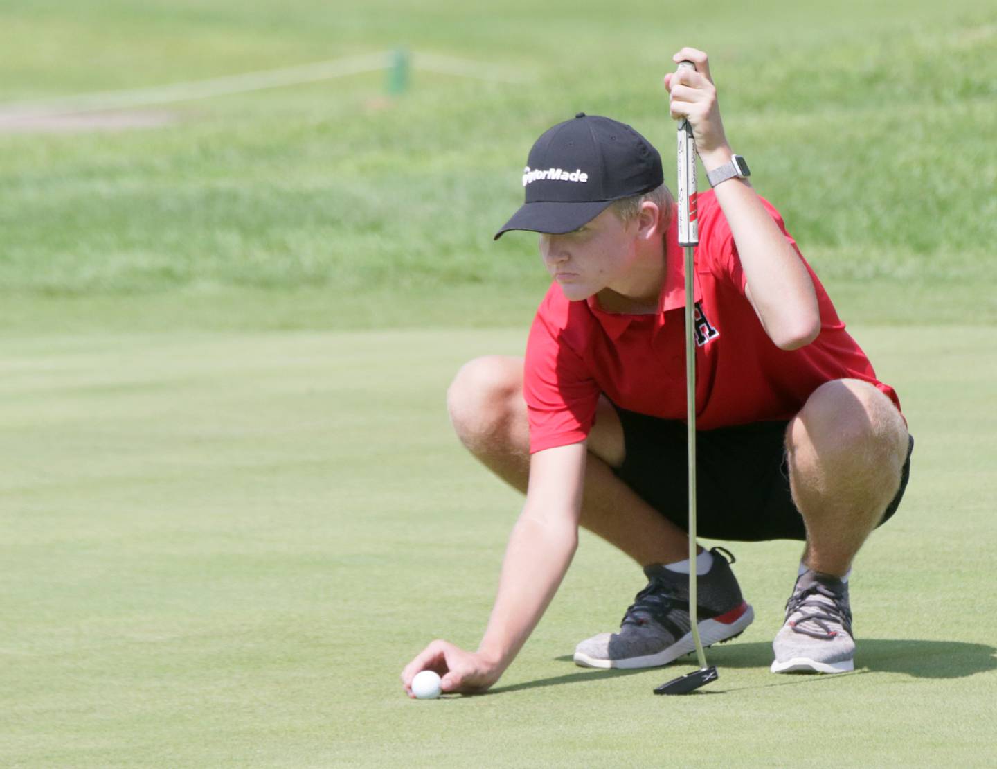 Hall's Landen Plym lines up a put during the L-P Cavalier Golf Invitational on Thursday, Aug. 18, 2022 at Seneca's Oak Ridge Golf Course in La Salle.