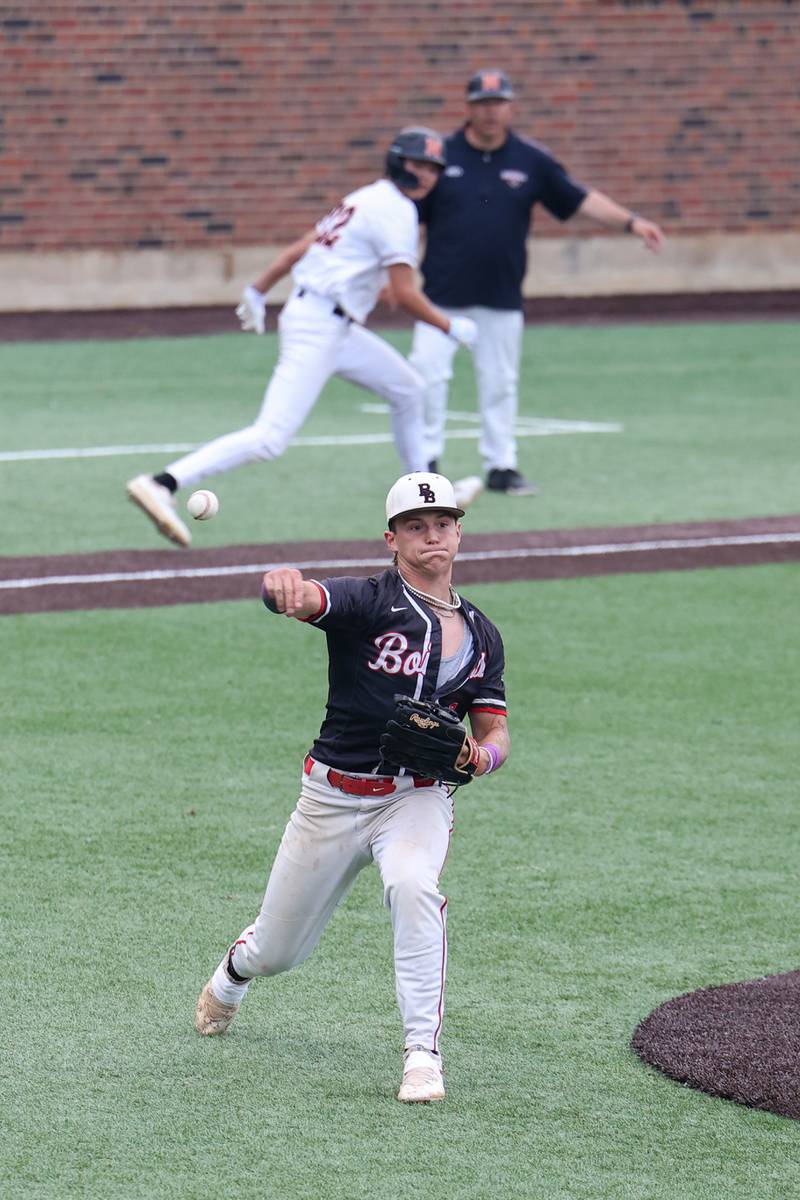 Bradley-Bourbonnais’ Cody Freitas looks to throw to first for an out after holding a runner at third during the Boilermakers’ 2-0 loss to Normal Community in the IHSA Class 4A Illinois Wesleyan University Sectional semifinal on Thursday, June 5, 2025.
