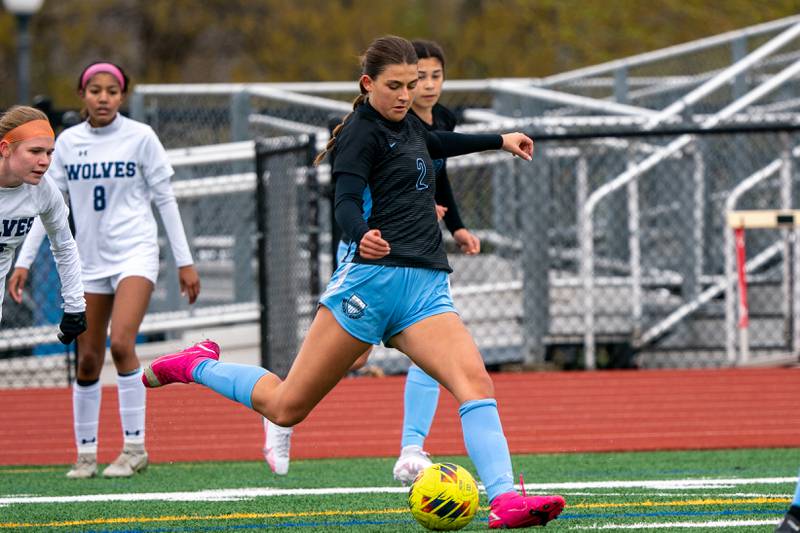 St. Charles North's Kayla Floyd (2) shoots the ball against Oswego East during a Naperville Invitational soccer match at Naperville Central High School on Saturday, April 22, 2023.