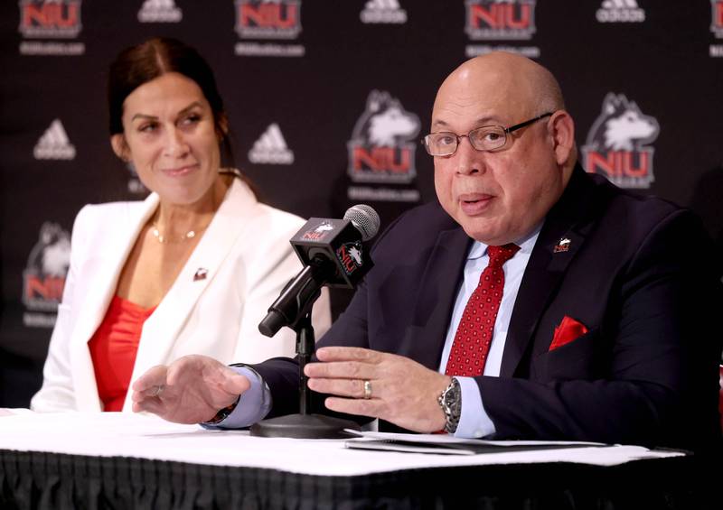 Sean Frazier, vice president and director of athletics and recreation at Northern Illinois University, talks about the qualities that made Jacey Brooks a good choice to be the new NIU women’s basketball coach as she looks on Wednesday, April 9, 2025, in the Convocation Center at Northern Illinois University.