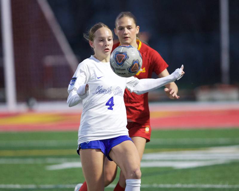 St. Charles North's Kaitlyn Nudera looks to control the ball against Batavia on Thursday, April 17,2025 in Batavia.