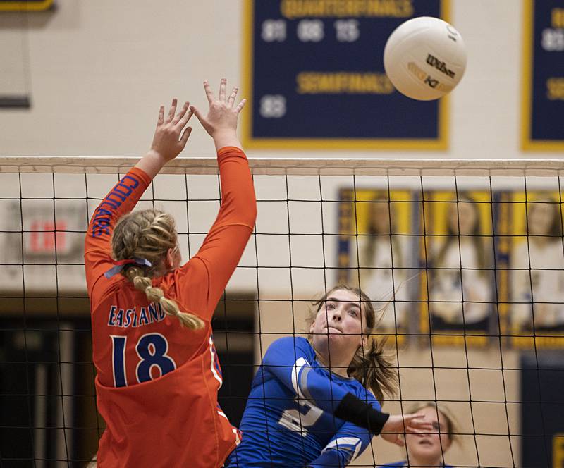 Newman’s Sophia Ely hammers a shot in game one Wednesday, Oct. 26, 2022 in the semifinal volleyball match against Eastland.