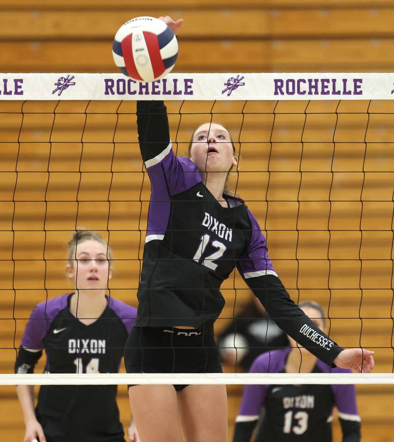 Dixon’s Izzy Queckboerner spikes the ball back to the Sycamore side Thursday, Oct. 30, 2025, during their Class 3A regional championship match in Rochelle