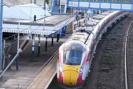 UK police release 1 of 2 men arrested over train stabbings and laud ‘heroic’ rail worker