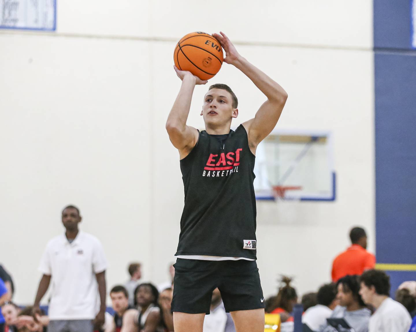 Glenbard East's Michael Nee (4) shoots a jumper in their Riverside-Brookfield Shootout basketball game.  June 20, 2025 in Riverside.