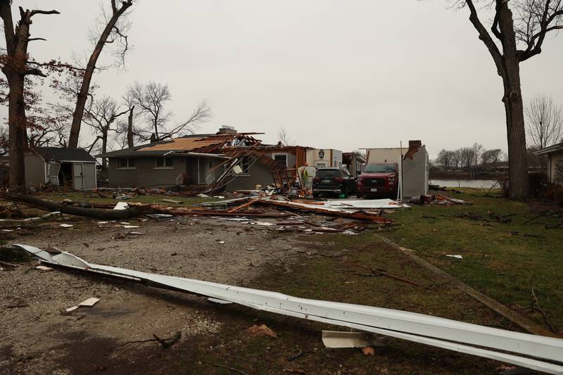 Damage is seen along Elmwood Drive in Aroma Park  on March 11, 2026 following a March 10 tornado that passed through Kankakee County.