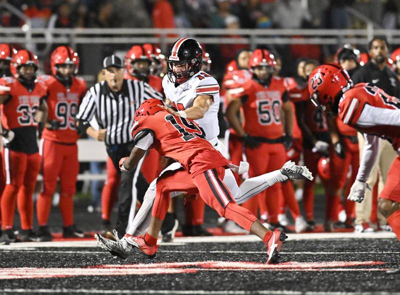 Lincoln-Way Central's Michael Kuehl attempts to run for a first down during a non-conference game against Bolingbrook on Friday, Sep. 29, 2023, at Bolingbrook. (Dean Reid for Shaw Local News Network)