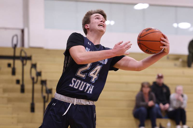 Plainfield South’s Nolan Gerdich goes for the shot against Lockport on Wednesday January 25th, 2023.