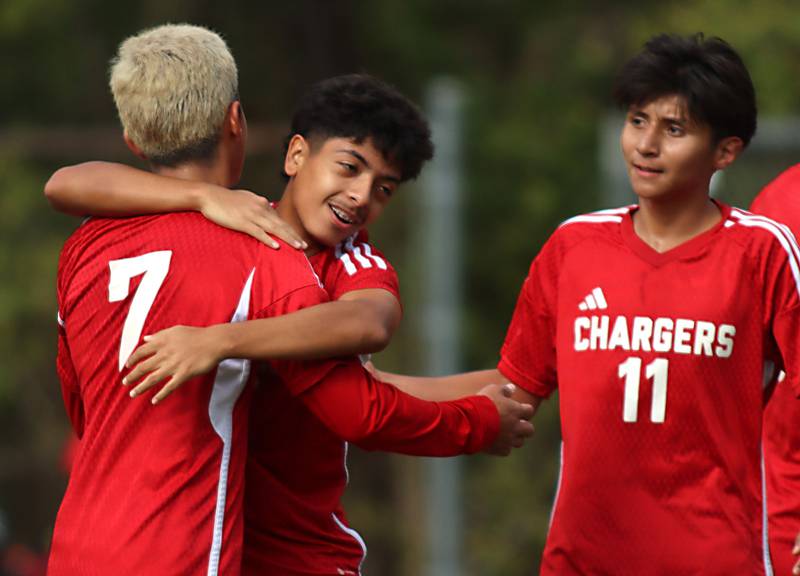 Dundee-Crown’s Chargers celebrate a 4-2 win over St. Charles East in IHSA Class 3A Regional Championship soccer at Dundee-Crown High School in Carpentersville on Saturday, October 25, 2025.