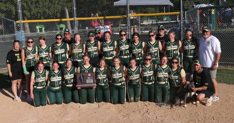 Members of the St. Bede softball team pose with the Class 1A Sectional plaque after defeating Biggsville 3-1 in the Class 3A Sectional championship on Friday, May 26, 2023 at St. Bede Academy.