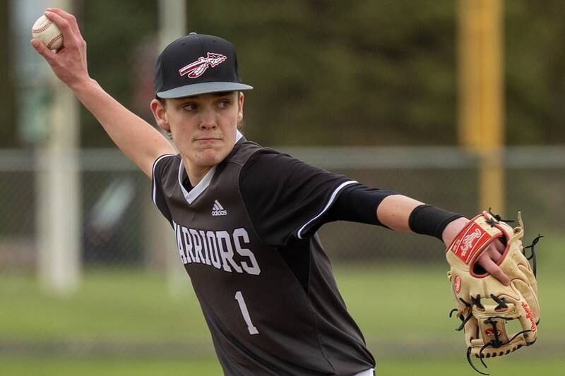 Nolan Price (1) of Woodland/Flanagan-Cornell pitches on Thursday, April 17, 2025 at Woodland High School in Streator.