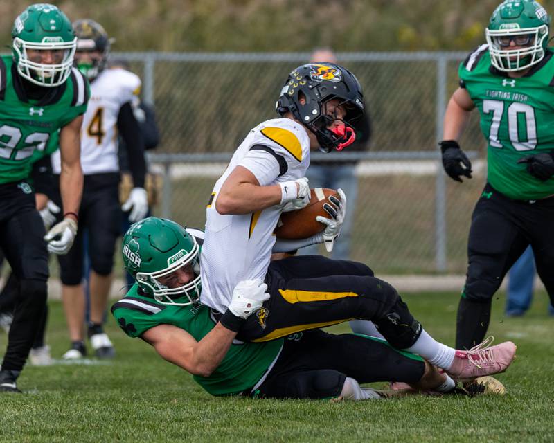 Joey Arnold (9) of Seneca brings down Jackson Tegeler (2) of Riverdale on Saturday, November 1, 2025 at Seneca High School in Seneca.