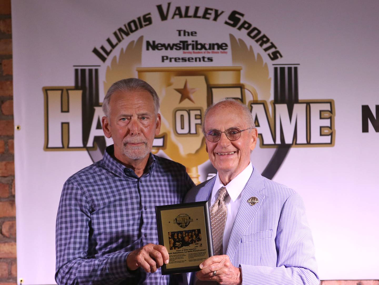 Mark Haberkorn, La Salle-Peru Township High School head volleyball coach smiles as is is introduced on stage during the Shaw Media Illinois Valley Sports Hall of Fame on Thursday, June 8, 2023 at the Auditorium Ballroom in La Salle.