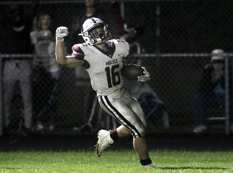 Prairie Ridge's Dominic Creatore celebrates his touchdown during a Fox Valley Conference football game against  Cary-Grove on Friday, Sept. 22, 2023, at Cary-Grove High School in Cary.