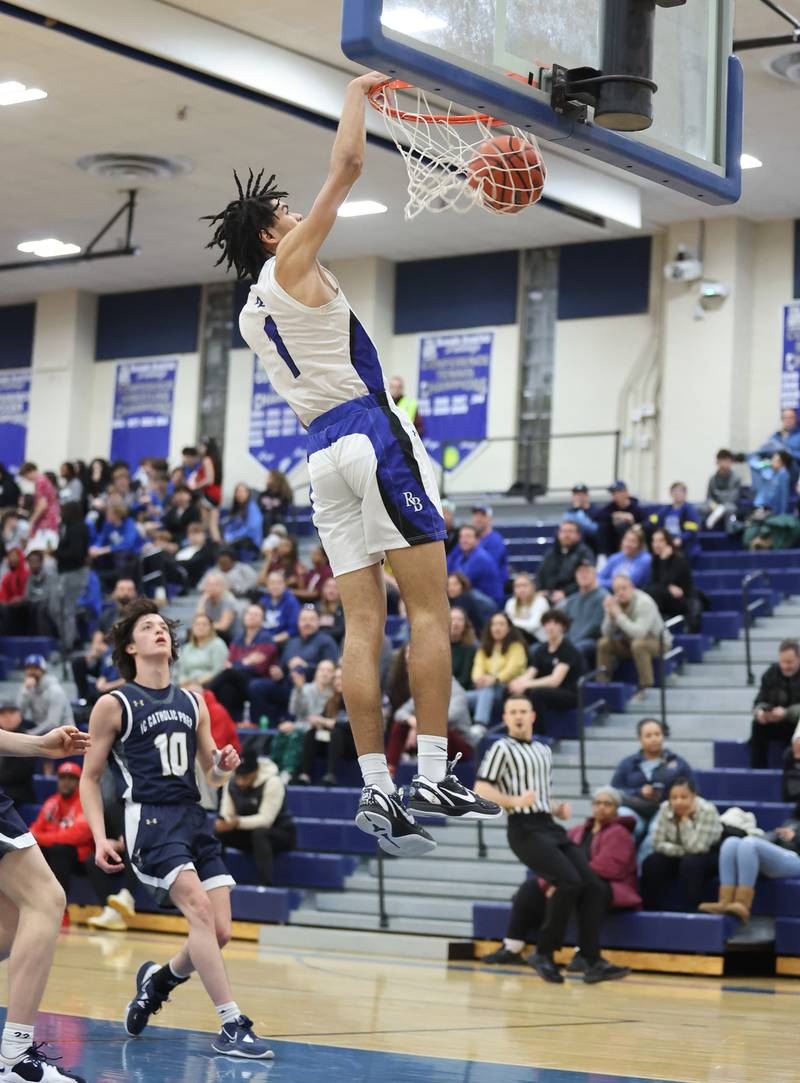 Riverside Brookfield's William Gonzalez (1) dunks during the boys varsity basketball game between IC Catholic Prep and Riverside Brookfield in Riverside on Tuesday, Jan. 24, 2023.