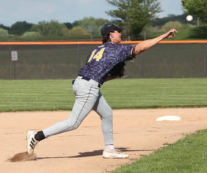 Neuqua Valley's Daniel Marketti  fires the ball to first during their game against DeKalb Tuesday, May 7, 2024, at DeKalb High School.