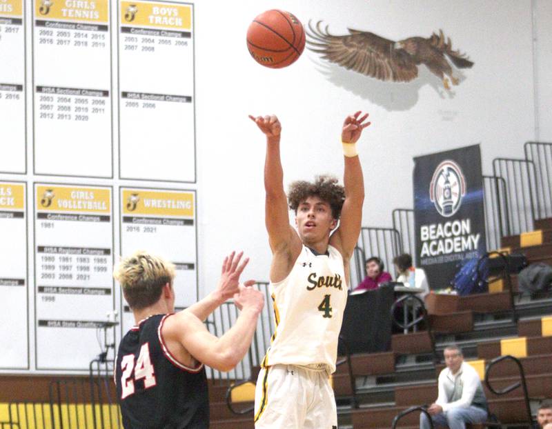 Crystal Lake South’s AJ Demirov makes an outside shot against Barrington in Hinkle Holiday Classic boys basketball tournament game action at Jacobs High School Tuesday.