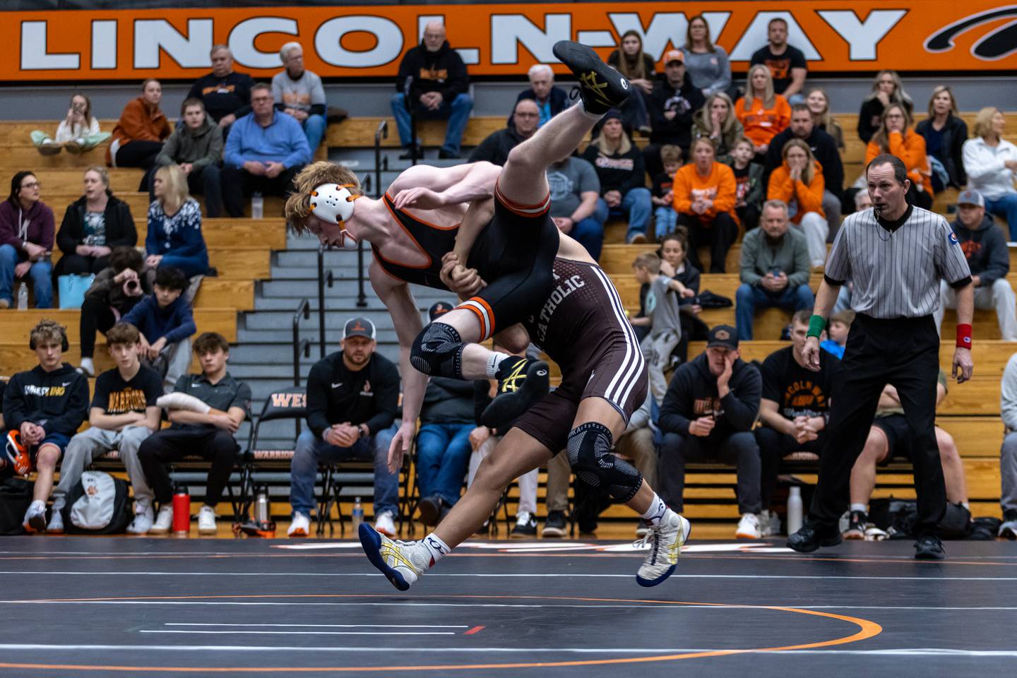 Joliet Catholic’s Matthew Laird and Lincoln-Way West’s Jack Strenzo compete in the 145 pound match at Lincoln-Way West on Jan. 8, 2026.