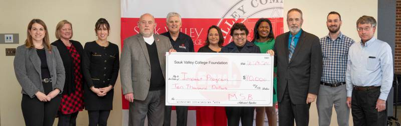 The Midland Bank Foundation presented a $10,000 contribution to the Sauk Valley Community Foundation for the Sauk Impact Program.