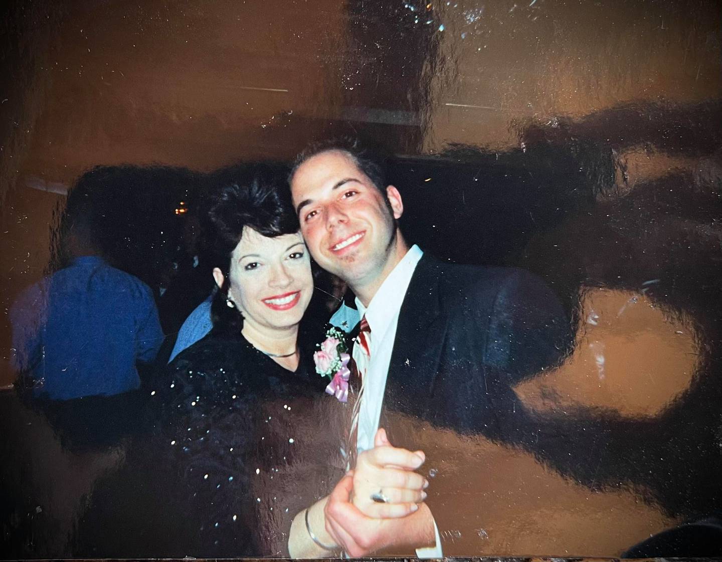 Carmel Perino dances with her son Louis Yangas around 1998.