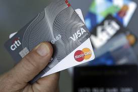 In a blow to banks, pioneering swipe fee law survives first legal challenge