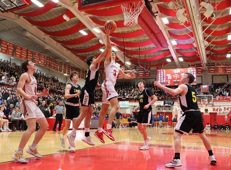 Hinsdale Central's Emerson Eck (3) goes to the rim during the boys 4A varsity sectional semi-final game between Hinsdale Central and Lyons Township high schools in Hinsdale on Wednesday, March 1, 2023.